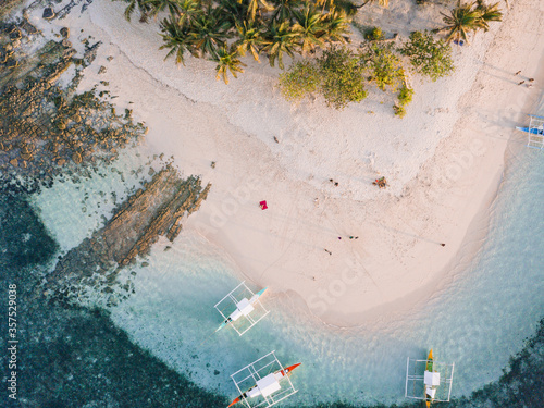 Aerial photos of Guyam Island, a tear-drop shaped island in the Philippine Sea situated around 2 kilometres south-southeast of General Luna municipality. Popular stop for tourists doing island-hopping photo