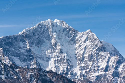 Thamserku mountain peak view from Dingboche village, Himalaya mountains range in Everest base camp trekking route, Nepal