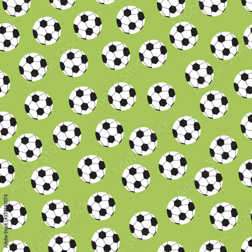 Vector seamless pattern with soccer balls on green background. Team sport wallpaper, wrapping paper, fabric design