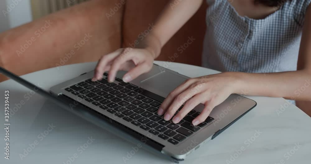 Woman work on laptop computer at home Woman work on laptop computer at home