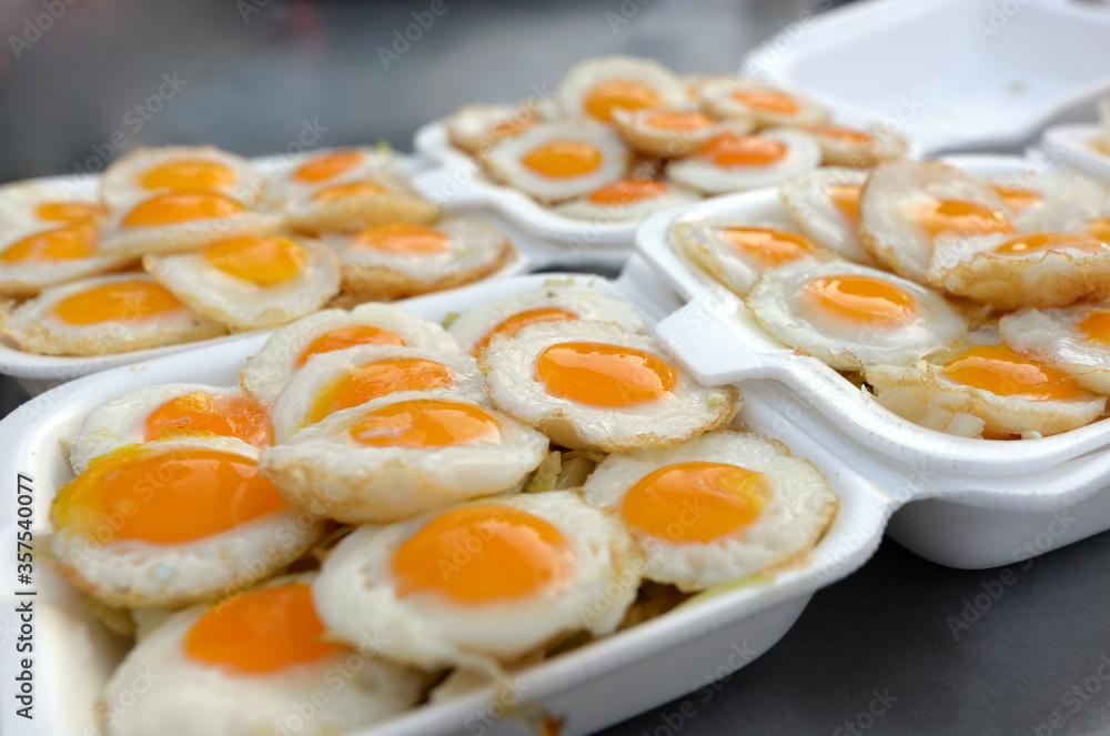 Quail eggs fried in a foam box Quail eggs fried in a foam box