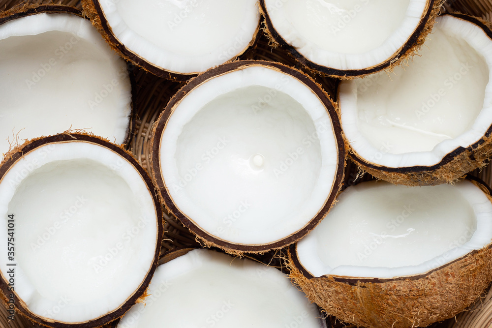 Top view of ripe coconuts in basket. Top view of ripe coconuts in basket.