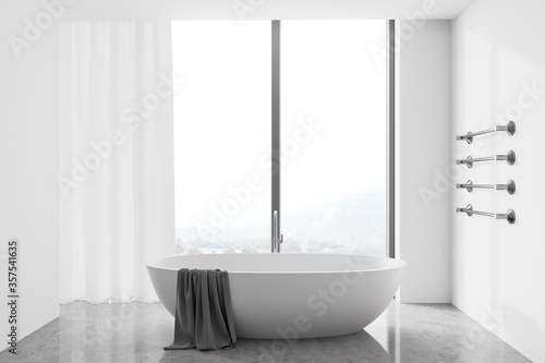 Panoramic white bathroom with tub