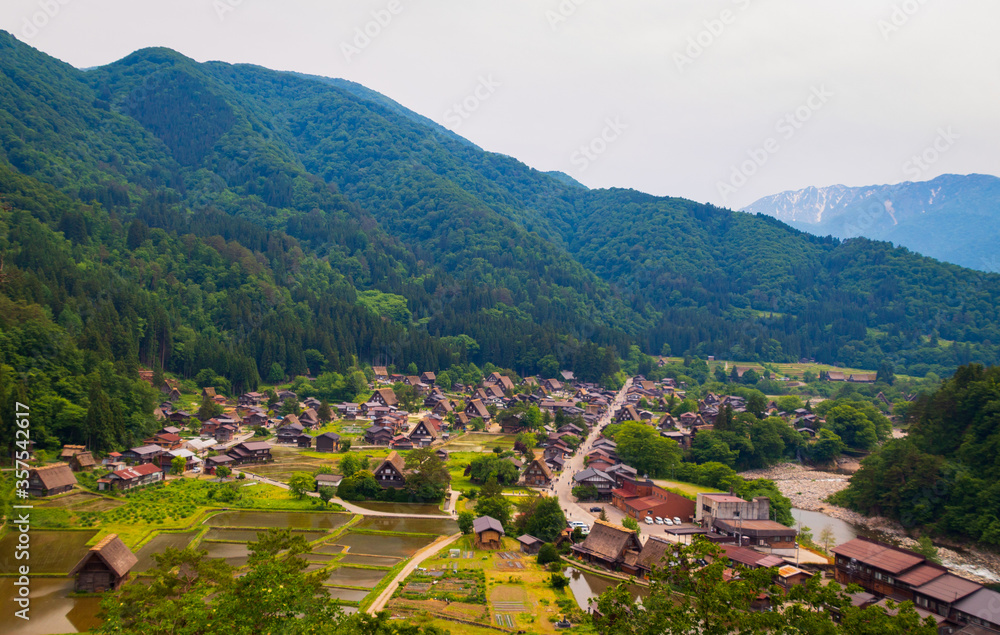 Shirakawago view from a lookout point on a cloudy day, during spring, Gifu, Japan