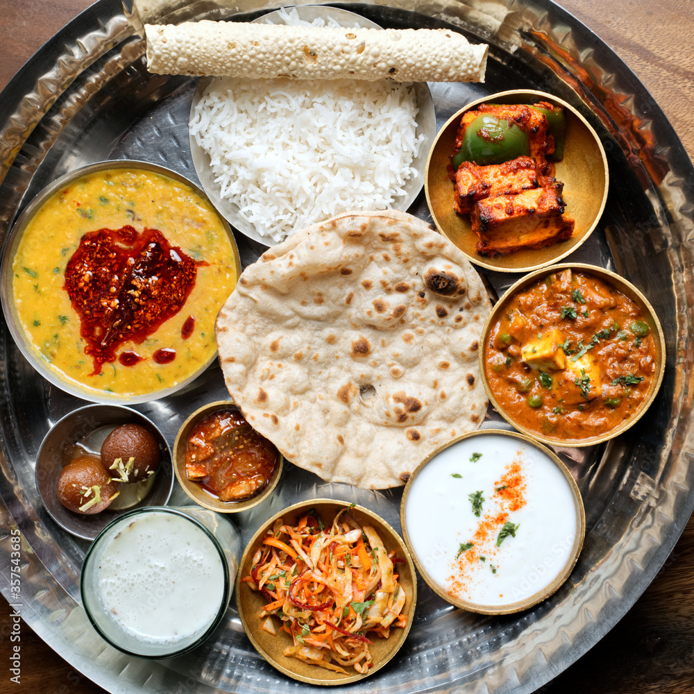 Indian Thali with Rice, Curry, Gravy, Bread, Pickles and Sweet Dish ...