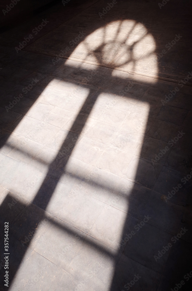Sunlight down from the window As a window shape on floor, contrast between shadow black and light Sunlight down from the window As a window shape on floor, contrast between shadow black and light