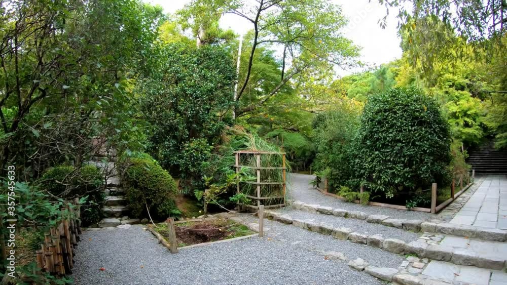 Video walk through the garden of the temple Ryoan-ji. Stone Buddha statue. Kyoto. Japan Video walk through the garden of the temple Ryoan-ji. Stone Buddha statue. Kyoto. Japan
