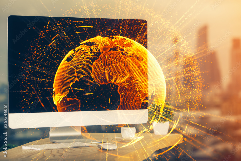 Obraz premium Computer on desktop with social network theme icon. Multi exposure. Concept of international connections.