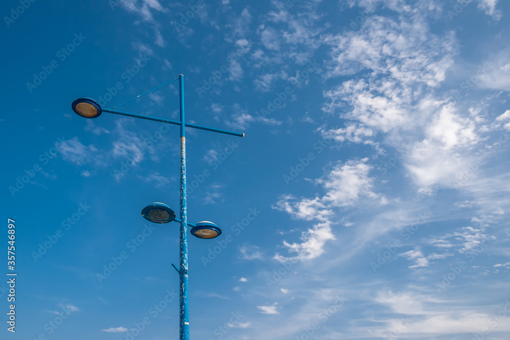 Lamppost against the sky and clouds Lamppost against the sky and clouds