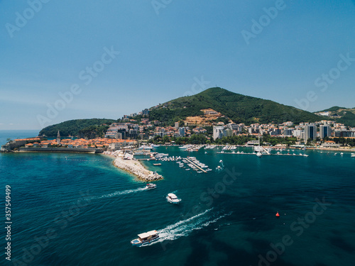 Boat dock and yacht port in Budva, Montenegro. Aerial photo from the drone.