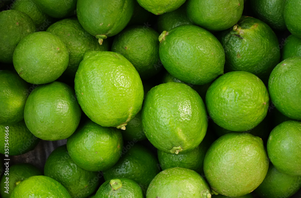 Lime from the organic garden, green nature background Lime from the organic garden, green nature background