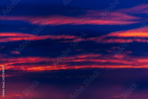 Colorful clouds at sunset as a background.