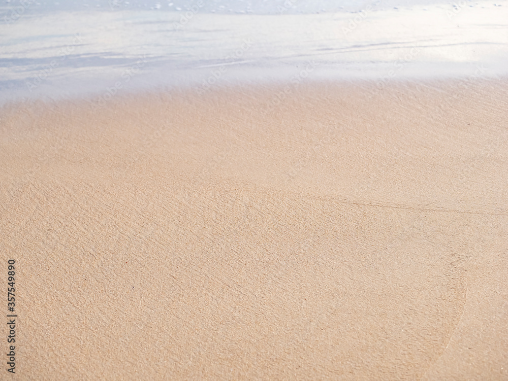 close up sand with wave of sea beach close up sand with wave of sea beach