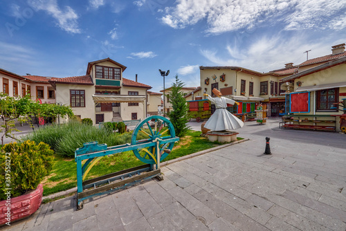 Canvas Print Konya, Turkey - a city of dancing dervishes, in the foreground a statue of a moc
