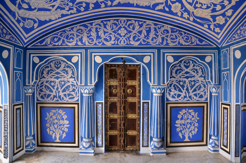 The Blue Palace in Chandra Mahal are beautifully adorned with blue and white coloured rooms in city palace jaipur, rajasthan, india April 2018. This room was used to enjoy the monsoon rain. photo