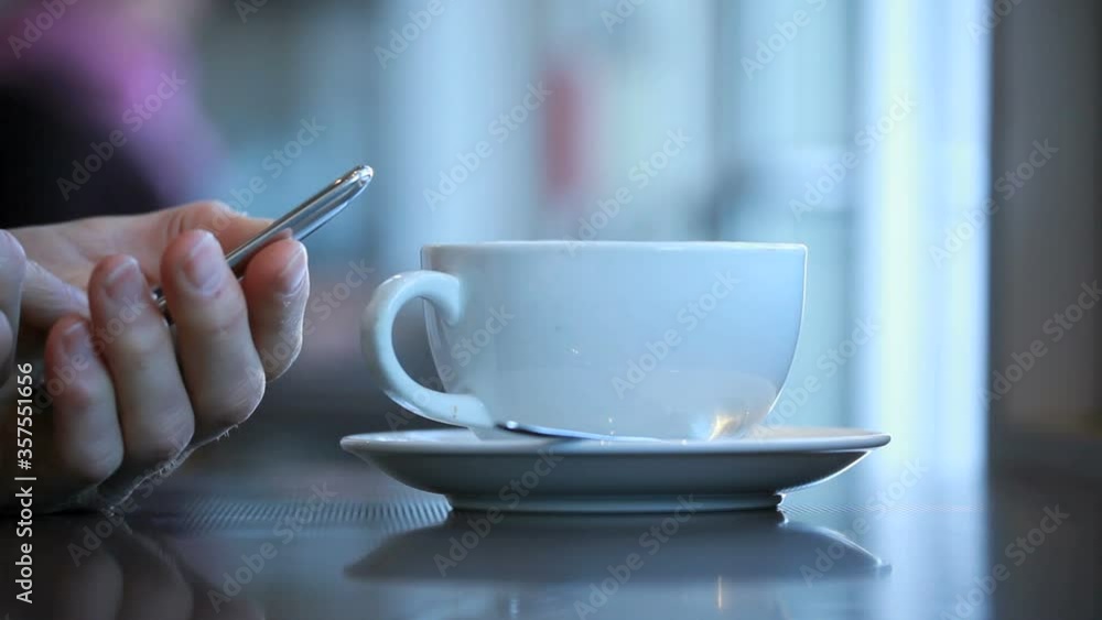 Sending email or text at a coffee shop Sending email or text at a coffee shop