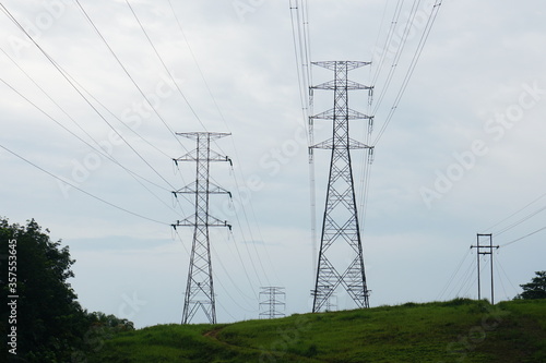 Electricity pylons and power lines.