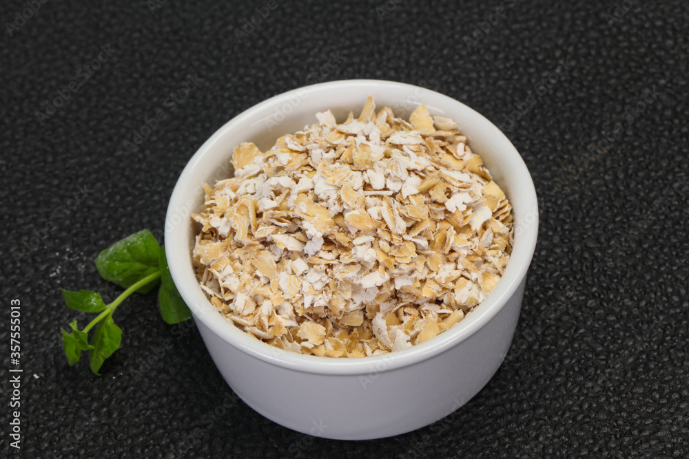 Raw oats in the bowl Raw oats in the bowl