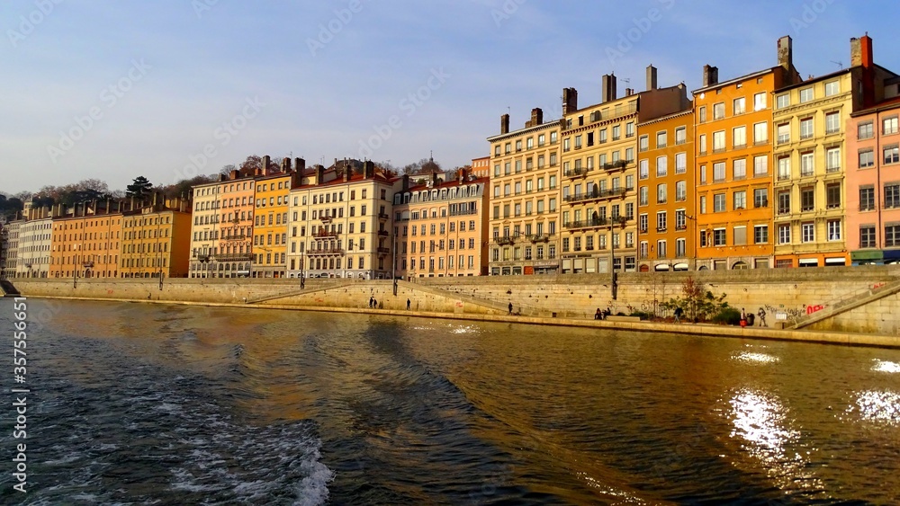 Fototapeta premium Europe, France, Auvergne Rhone Alpes region, city of Lyon, facade of building along the river