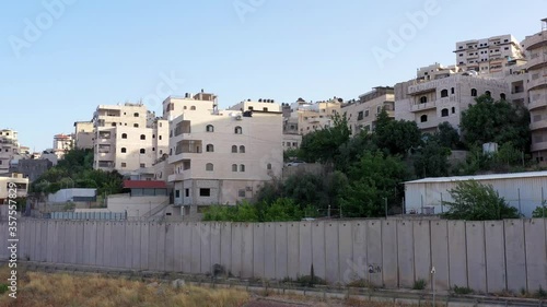 Palestine Refugges Camp Behind Concrete wall -aerial
Dolly shot,Anata,Jerusalem,June,2020
 photo