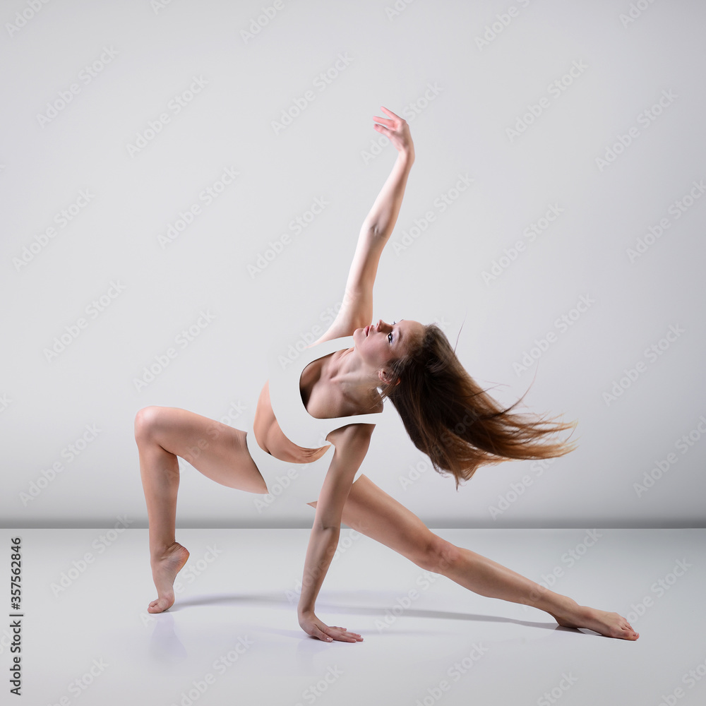 Young beautiful graceful woman with perfect slim sporty body dancing and jumping. Female beautiful contemporary dance. Ease of movement, youth, grace, joint pain relief and movement Young beautiful graceful woman with perfect slim sporty body dancing and jumping. Female beautiful contemporary dance. Ease of movement, youth, grace, joint pain relief and movement
