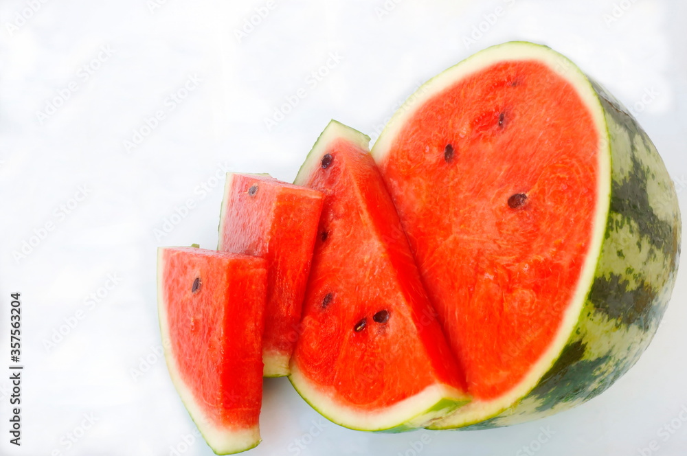 Ripe watermelon. Pieces of red watermelon. White background. Ripe watermelon. Pieces of red watermelon. White background.