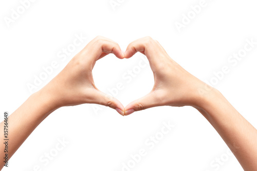 Close up female hands making sign heart by fingers isolated on white background. Love concept