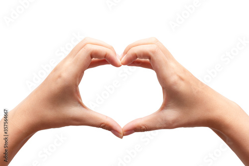 Close up female hands making sign heart by fingers isolated on white background. Love concept