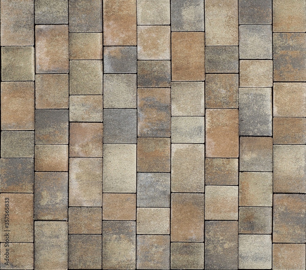 Brown and gray rustic style tiles for outdoor floorings and sidewalk. Background and texture. Brown and gray rustic style tiles for outdoor floorings and sidewalk. Background and texture.