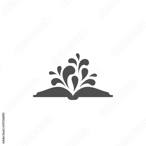 Black Open book with paint drops flying out. Isolated on white background.