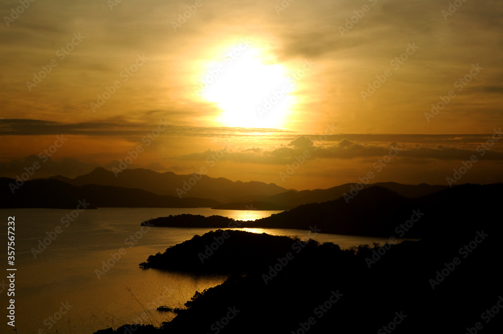 Sunset view from Mount Tapyas overlooking mountains and sea