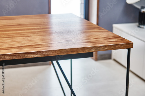 Wooden office desk. Walnut veneer desk with metal base