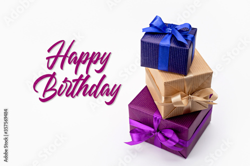 Happy Birthday. Set of vertical boxes with gifts and surprises, packed in elegant paper.