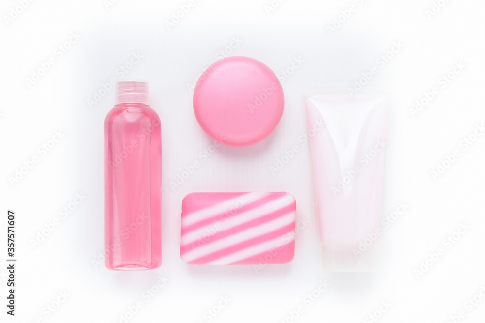 Cosmetics for beauty and skin care, makeup. Cleansing tonic, moisturizing and nourishing cream with collagen and lifting effect, lip balm, natural soap on a white background Cosmetics for beauty and skin care, makeup. Cleansing tonic, moisturizing and nourishing cream with collagen and lifting effect, lip balm, natural soap on a white background