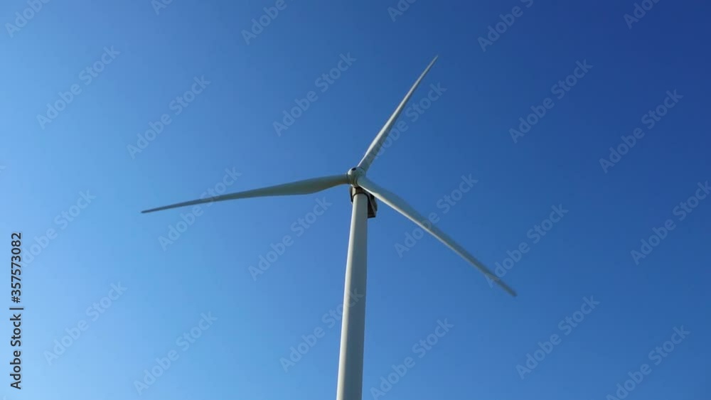 Wind turbine against the blue sky Wind turbine against the blue sky