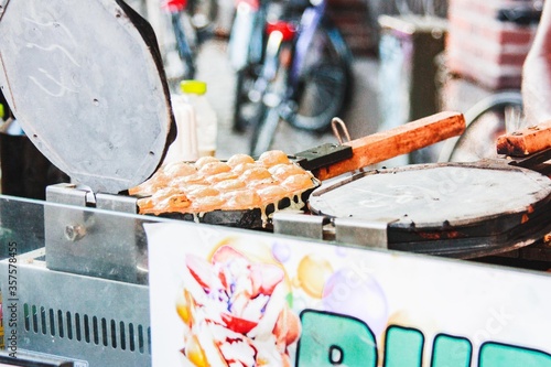 Fototapeta Naklejka Na Ścianę i Meble -  Pancake on frying pan street food sweets