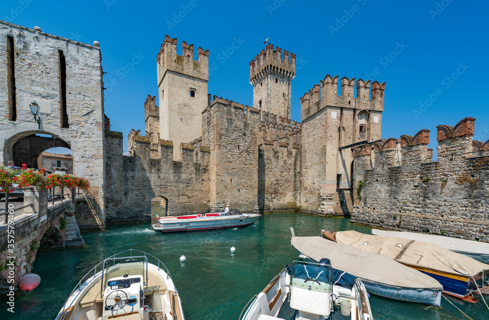 Sirmione, Italy - July 14, 2018: Scaliger Castle (13th century) in Sirmione on Garda lake in Italy
