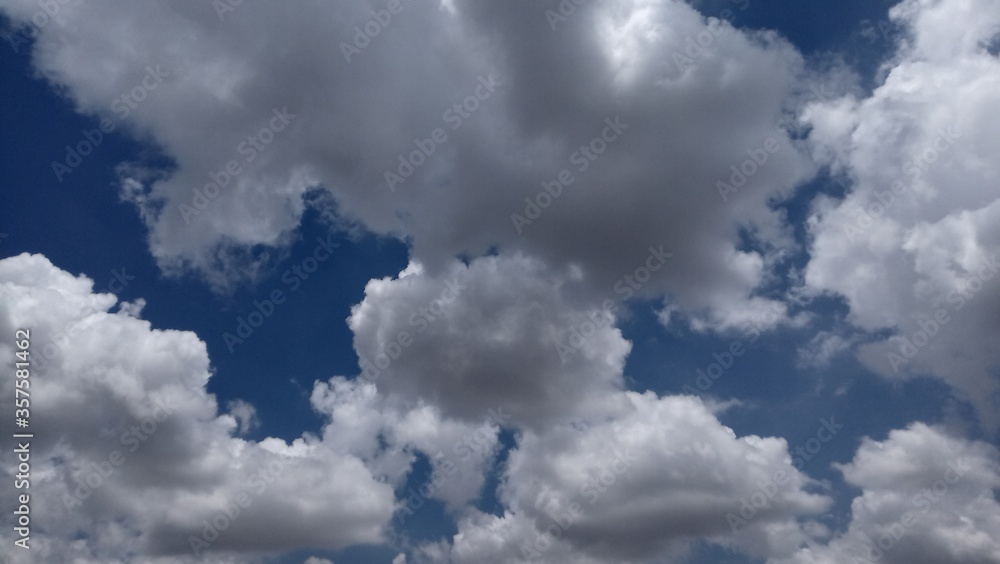 Fototapeta premium beautiful white clouds in sky. Abstract cloudscape wallpaper.