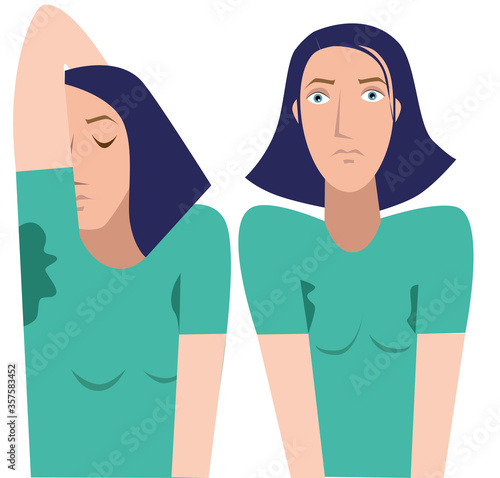 Young woman in a T-shirt with sweat stains under the armpit