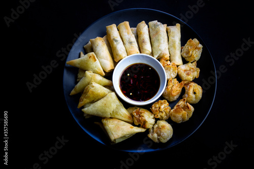 Asian Appetizers, Dumplings, Spring Rolls, Dim Sim and Sauces photo