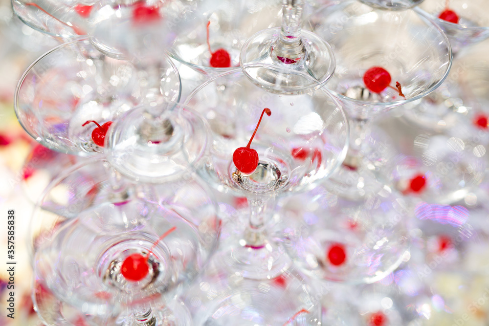 Pyramid of glasses, cherry in the glass Pyramid of glasses, cherry in the glass