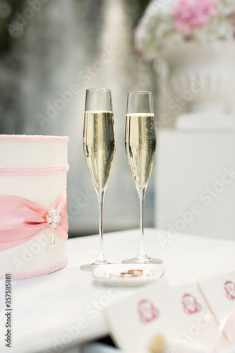 Wedding glasses with champagne on the table