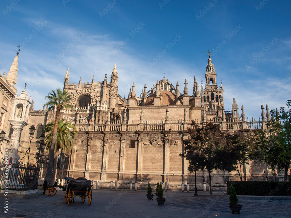 View of the Cathedral from the entrance of the Real Alcázar, it is one of the largest Gothic cathedrals in the world, a World Heritage Site, Seville, spain