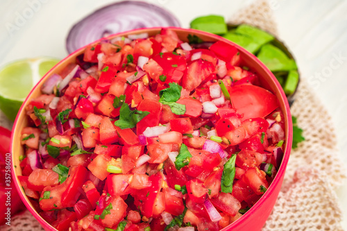 Organic homemade Tomato Salad Mexican food fresh vegan appetizer