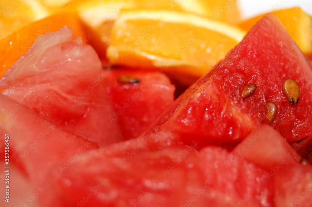 Natural nutritious fruits orange and watermelon Natural nutritious fruits orange and watermelon