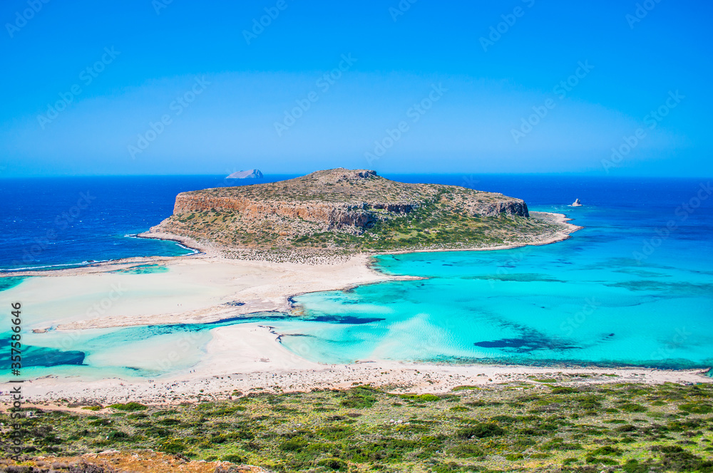 Balos Bay in Crete, Greece. Turquoise, clear sea view. Nature around the island. Famous tourist destination. Beautiful lagoon.