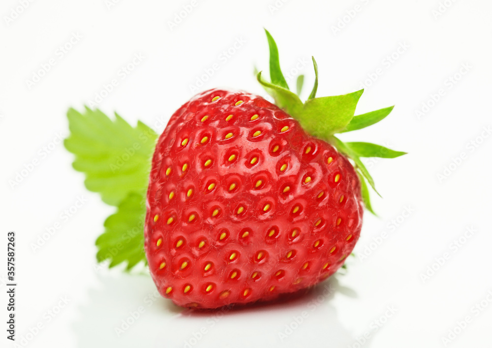 Fresh raw organic strawberry with leaf on white background. Fresh raw organic strawberry with leaf on white background.