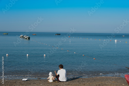 pap   con bimbo sulla spiaggia