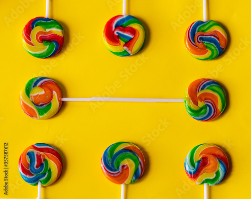 colorful lollipop on yellow