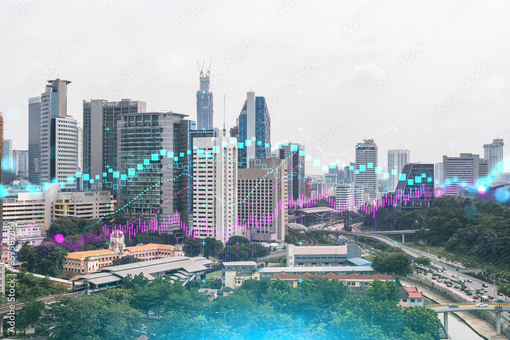 Fototapeta premium Forex and stock market chart hologram over panorama city view of Kuala Lumpur. KL is the financial center in Malaysia, Asia. The concept of international trading. Double exposure.